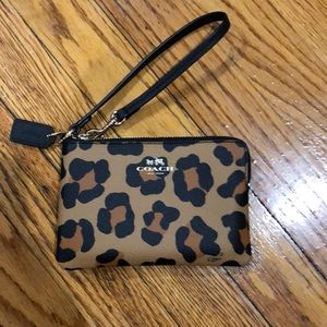 Coach patterned wristlet